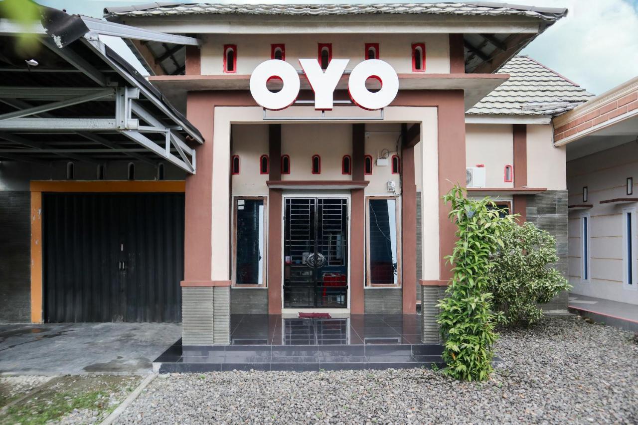 بادانج Oyo 2202 Delima Guest House Syariah المظهر الخارجي الصورة